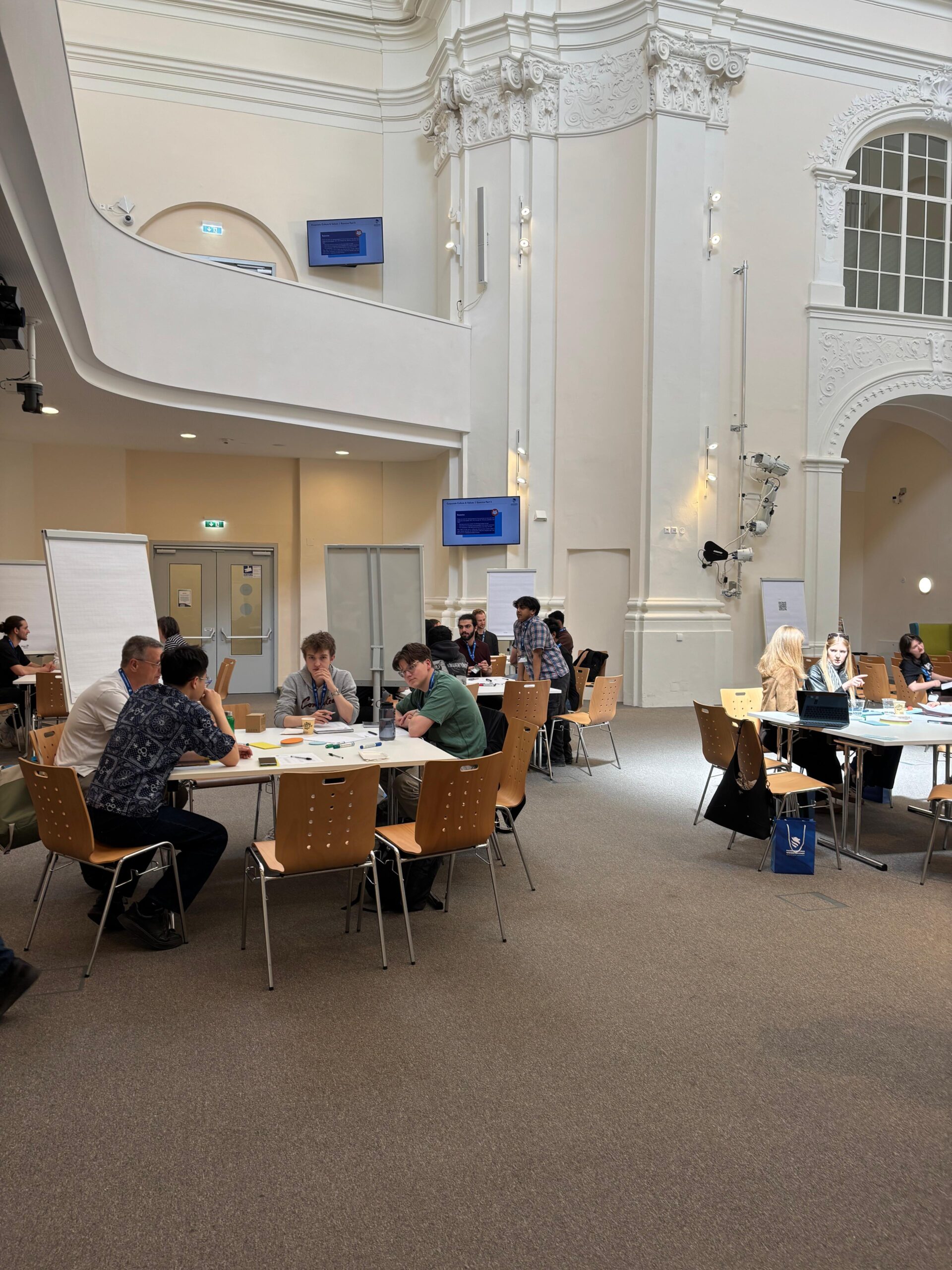 Green HExagon participants working in small groups during the international start-up bootcamp at the University of Applied Sciences Wiener Neustadt